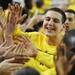 Michigan freshman Mitch McGary smiles as he high-fives fans while heading to the locker room before the start of the Wolverine's home game against Michigan State at Crisler Center on Sunday, March 3, 2013. Melanie Maxwell I AnnArbor.com